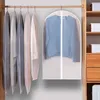 Garment bags hanging on a clothes rack. Produktbild-Vorschau