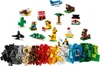 A collection of small LEGO builds and loose LEGO bricks. Produktbild-Vorschau