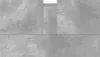 A close-up view of a concrete-like textured surface, possibly a cabinet or wall panel. Náhľad obrázku produktu