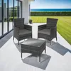 A rattan furniture set for two people is placed on a patio with a view of the ocean. Náhled obrázku produktu