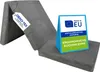 A folded gray mattress with informational tags and a triangular sign. Produktbild-Vorschau