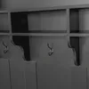 A close-up view of a black wooden furniture piece, likely a wardrobe or shelving unit, with visible hooks and shelves. Anteprima dell’immagine prodotto