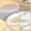 A collage of close-up images showing details of a modern LED ceiling light fixture, including its rings, LED strip, and material texture. Voir les images du produit