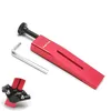 A red bicycle brake tool and an Allen wrench are displayed on a white background. A small inset image shows a close-up of a bicycle brake caliper. Produktbild-Vorschau