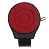 A top-down view of a round, red car seat cushion with a black base and strap. Náhled obrázku produktu