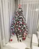 A decorated Christmas tree with presents underneath, a reindeer, and a Santa Claus figure. Podgląd zdjęcia produktu