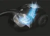 A cutaway view of a black vacuum cleaner with blue light effects illustrating airflow and internal components. Náhled obrázku produktu