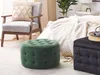 A bedroom scene with a chair, bed, and two ottomans. Náhled obrázku produktu