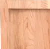 A close-up view of a light brown wooden surface, showing the grain and texture of the wood. Produktbild-Vorschau
