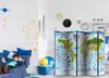 A child is lying on a bed in a room decorated with space-themed wall decals. A room divider with a world map design is also present. Náhľad obrázku produktu