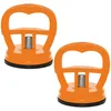 Two orange suction cup dent pullers are shown against a white background. Produktbild-Vorschau