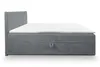 A side view of a gray corduroy box spring bed with a white mattress on top, set against a white background. Produktbild-Vorschau