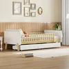 A child's bed with drawers and a guardrail, set in a bedroom. Podgląd zdjęcia produktu