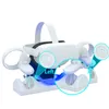 A white charging dock for Oculus Quest 2 VR controllers and headset, with blue LED lighting. Produktbild-Vorschau