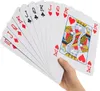 A hand holding a fan of oversized playing cards. Anteprima dell’immagine prodotto