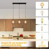 A kitchen scene with a pendant light fixture above a counter, and various light bulbs shown in separate panels. Anteprima dell’immagine prodotto