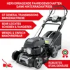 A black and gray lawnmower is shown with promotional text overlays highlighting its features. Produktbild-Vorschau