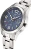 A close-up, angled shot of a women's wristwatch with a blue dial and silver metal band, against a white background. Náhled obrázku produktu
