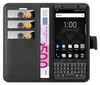 A black leather wallet-style phone case with a Blackberry KEYone phone inserted, showing credit cards and a 500 Euro banknote. Náhled obrázku produktu