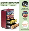 A chest of drawers designed to look like vintage suitcases, with additional marketing text and graphics on the right side. Podgląd zdjęcia produktu