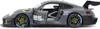 A model of a grey Porsche 911 GT2 RS Clubsport 25 race car with its driver's door open, shown from the side against a white background. Podgląd zdjęcia produktu