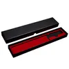 A black gift box with a red interior is shown open, revealing a black knife inside. Podgląd zdjęcia produktu