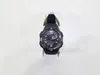 A black Casio watch is displayed on a white background, held by a stand. Produktbild-Vorschau
