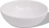 A white ceramic bowl on a white background with a shadow. Anteprima dell’immagine prodotto