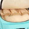 Kruzzel 8913 Dámský městský batoh 2v1 mátová Náhled obrázku produktu 10