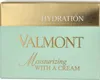 A close-up of the front of a Valmont Moisturizing With A Cream product box. Voir les images du produit
