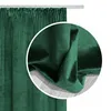 A close-up view of a dark green velvet curtain, showing the texture and drape of the fabric. Produktbild-Vorschau