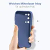 A hand holding a blue phone case against a white background. Produktbild-Vorschau