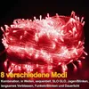A tangled ball of red LED string lights against a black background, with text describing the product's features. Produktbild-Vorschau