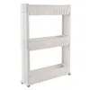 A white, three-tiered rolling storage cart with wheels. Voir les images du produit
