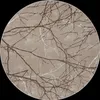 A round rug with a pattern of tree branches against a beige background.