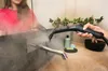 A person is using a steam cleaner to clean a bathroom faucet. Podgląd zdjęcia produktu