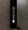 Close-up of a digital display on a black cylindrical object, showing timer and temperature settings. Náhľad obrázku produktu