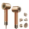 A product shot of a gold and brown hairdryer with multiple attachments, presented on a white background. Produktbild-Vorschau