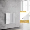 A white panel radiator mounted on a grey tiled wall, with an inset image showing a close-up of the radiator's connection and text details. Podgląd zdjęcia produktu