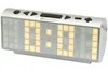 A silver and white digital alarm clock with a large LED display showing yellow digits. Produktbild-Vorschau
