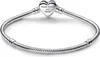 A silver Pandora bracelet with a heart-shaped clasp is displayed on a white background. Náhľad obrázku produktu