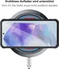 A smartphone is placed on a wireless charger, indicating that the case supports wireless charging. Produktbild-Vorschau