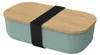 A mint-colored lunchbox with a wooden lid and a black elastic strap. Produktbild-Vorschau