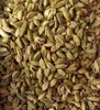 A close-up, overhead view of a pile of dried cardamom pods. Náhled obrázku produktu