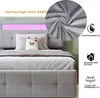 A close-up view of a bed with a headboard featuring LED lighting, pillows, and a close-up of the fabric texture. Produktbild-Vorschau