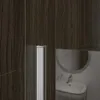 A close-up view of a shower wall with a wooden texture and a silver handle. A reflection of a sink and mirror is visible in the glass. Produktbild-Vorschau