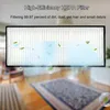 A close-up of a HEPA filter with animated leaves and bubbles, set against a blurred background of a room with a rug and wooden floor. Produktbild-Vorschau