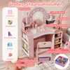 A pink children's vanity table with a mirror, chair, and various storage compartments, set in a child's room. Náhled obrázku produktu