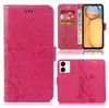 A collage of images showing a pink phone case with a floral and butterfly design, displayed in different configurations. Produktbild-Vorschau