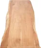 A top-down view of a wooden tabletop with a live edge. Produktbild-Vorschau